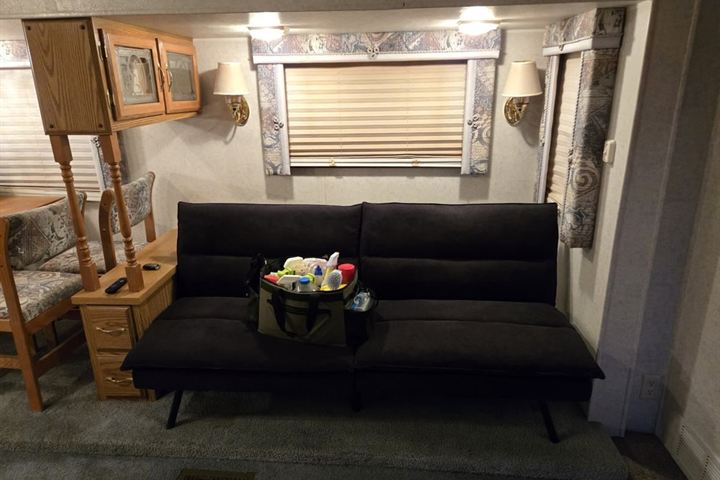 Inside the Coleman RV: couch and dinette